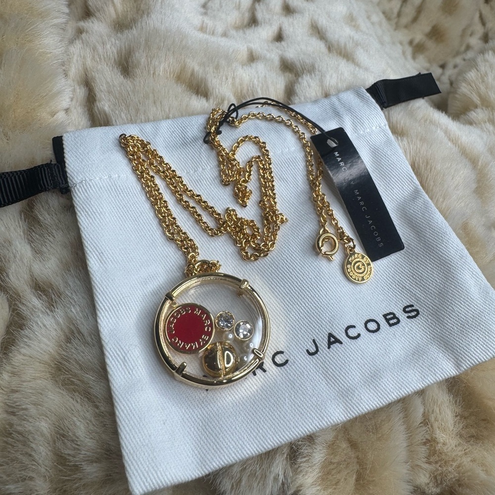 Marc Jacob’s Gold and Red Floating charm Necklace. NWT, w MJ dust bag.